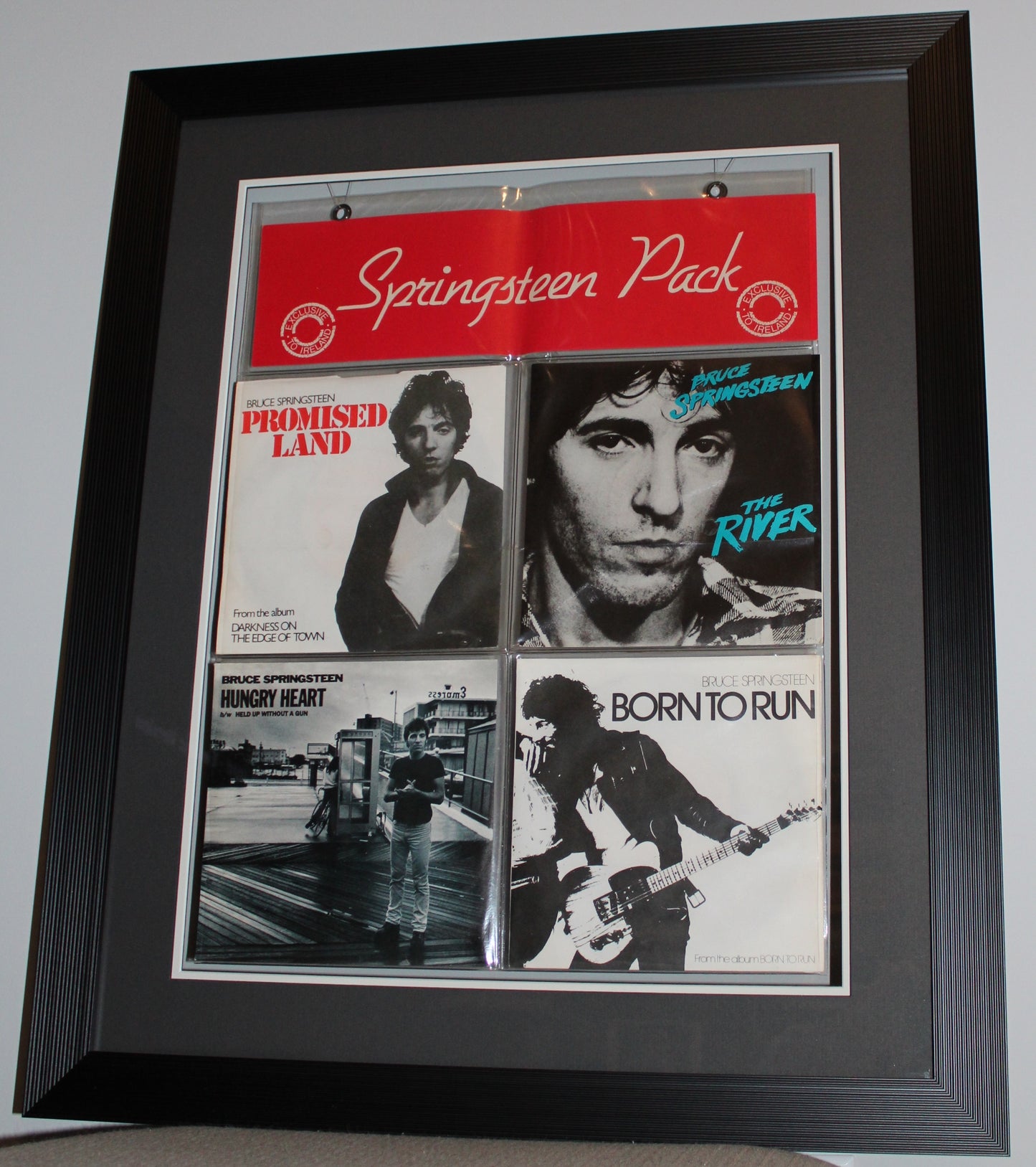 Bruce Springsteen "Springsteen Pack" Four 45 Records - One of a Kind Collectible Art